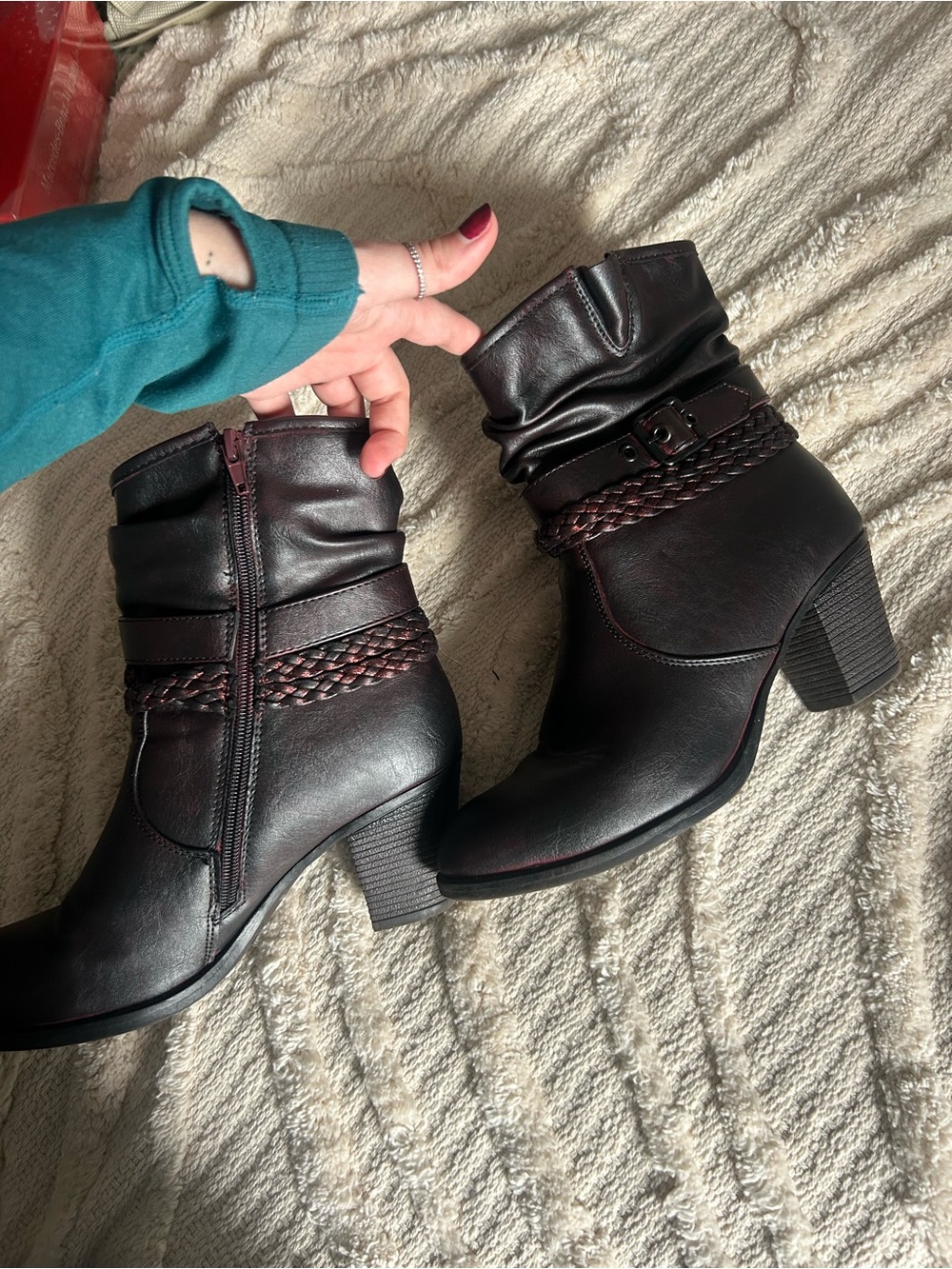 Dark purple heels boots.